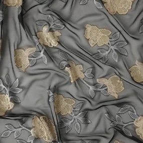 Black French silk chiffon fabric with steel grey, beige viscose and golden metallic lurex in floral design